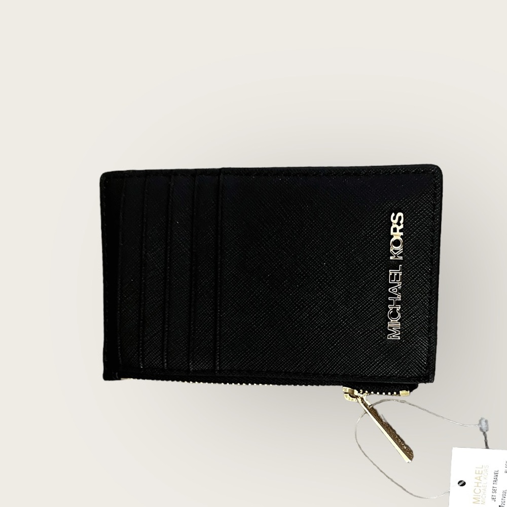 M I C H A E L  K O R S  W A L L E T
JET SET TRAVEL - MD TZ CARD CASE